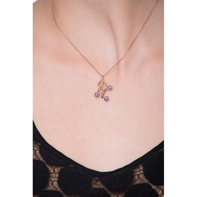 18k rose gold fancy pendant with rubies