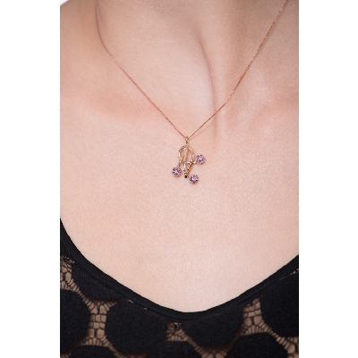 18k rose gold fancy pendant with rubies