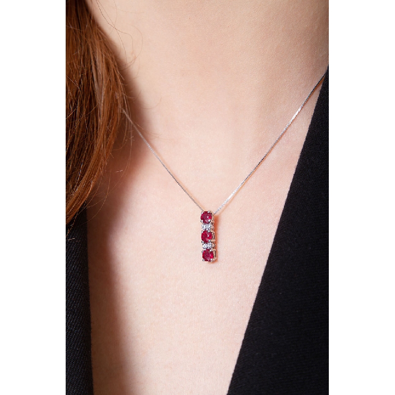 18k white gold necklace with ruby and diamond trilogy necklace