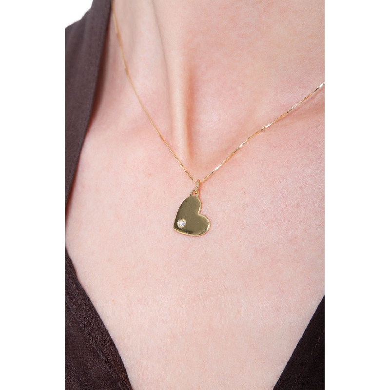 18k yellow gold inclined flat heart pendant with diamond