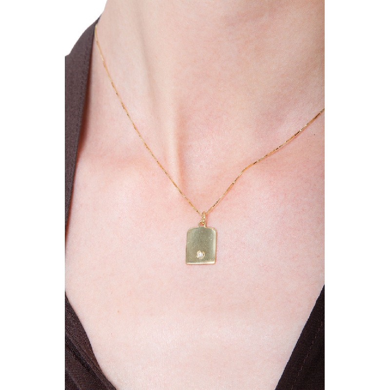 18k yellow gold slab with diamond