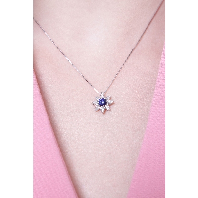 Necklace with pendant, central sapphire and diamond petals