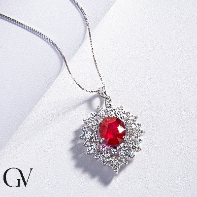 Necklace with pendant, oval cut ruby and a fancy crowd of diamonds