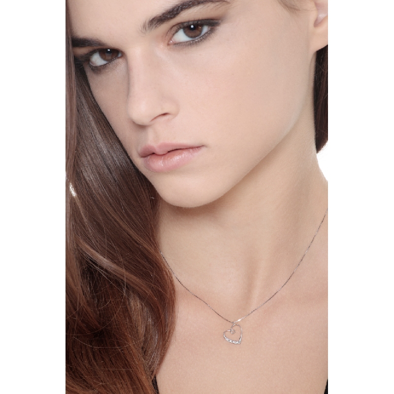 18k white gold heart pendant with a row of diamonds