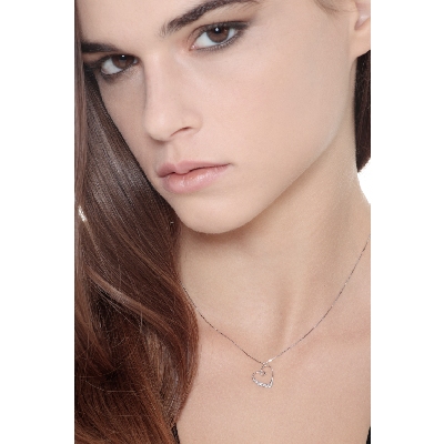 18k white gold heart pendant with a row of diamonds