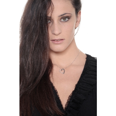 Heart shape pendant with black and white diamonds