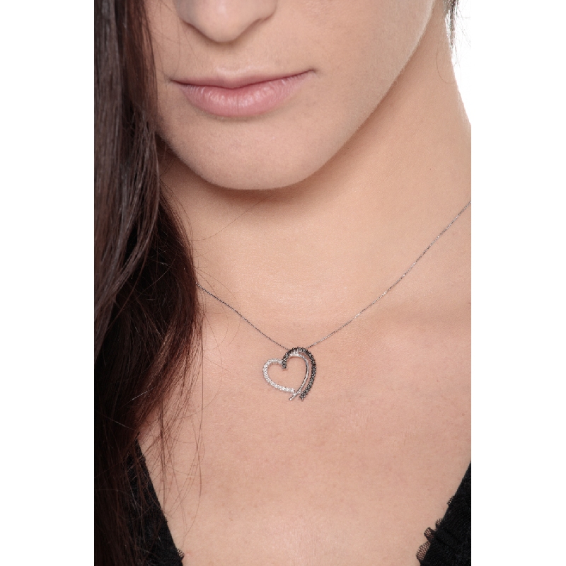 Heart shape pendant with black and white diamonds