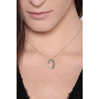 Heart shape pendant with diamonds and a row of emeralds