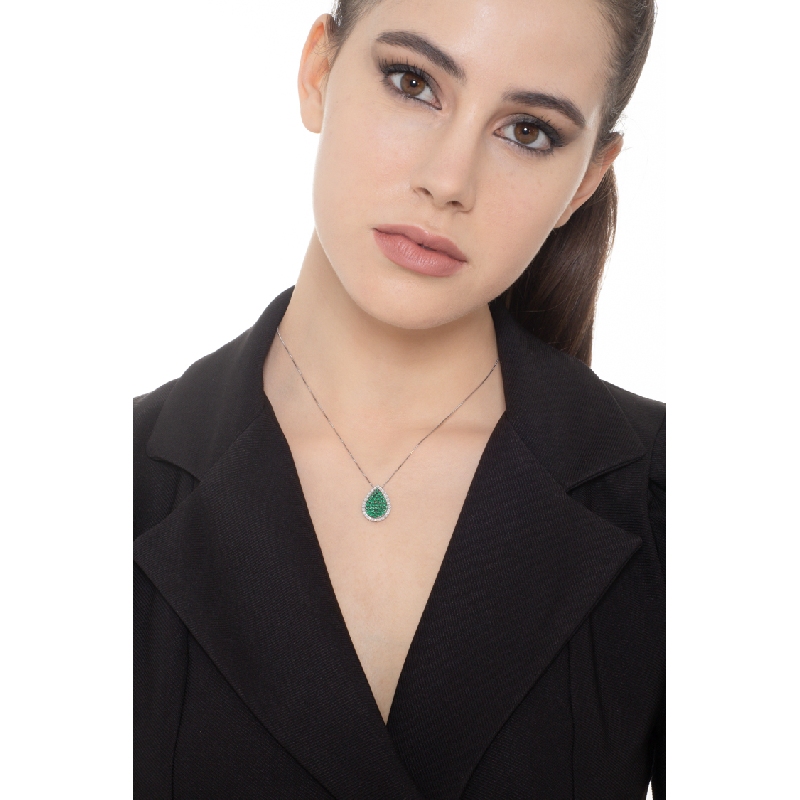 18k white gold drop shaped pendant with emeralds and diamonds