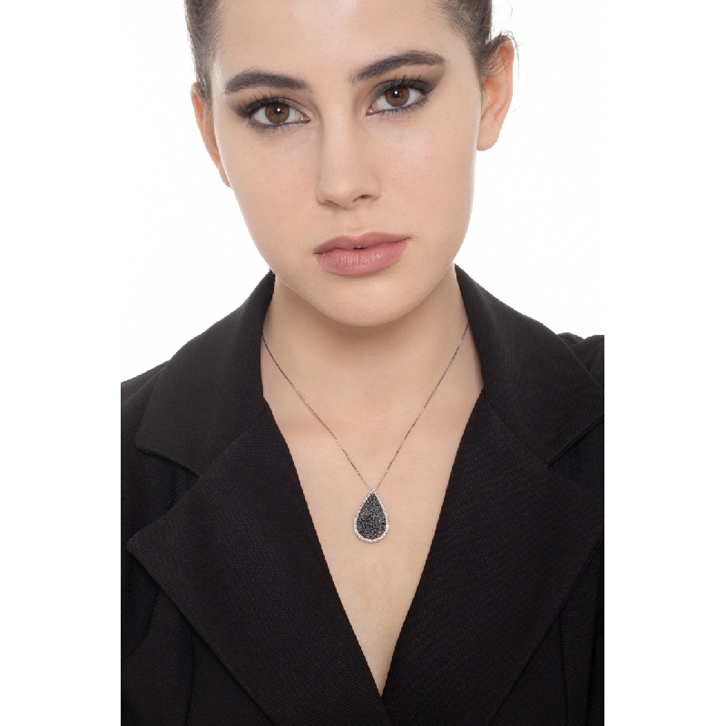 18k white gold drop shape pendant with black and white diamonds