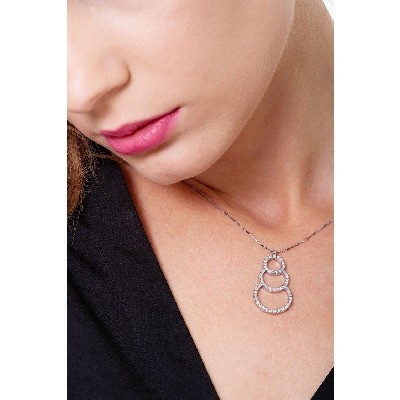 18k white gold triple circle pendant with diamonds