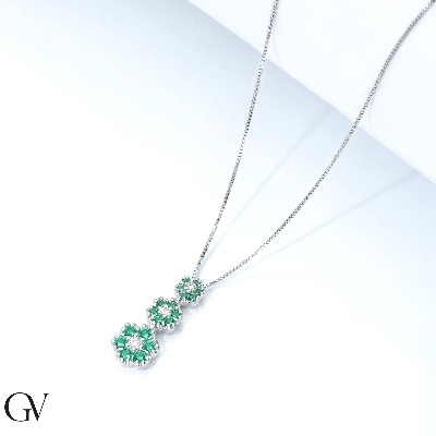 White gold 18k necklace with flower shaped trilogy pendant with diamonds and emeralds 