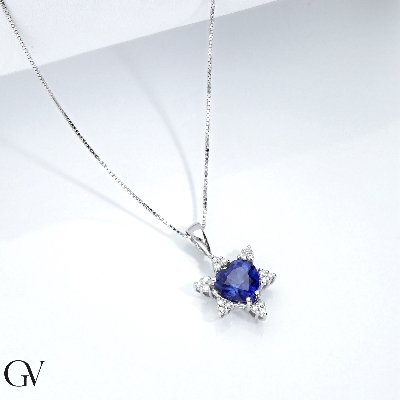 Heart shaped blue sapphires and diamonds pendant