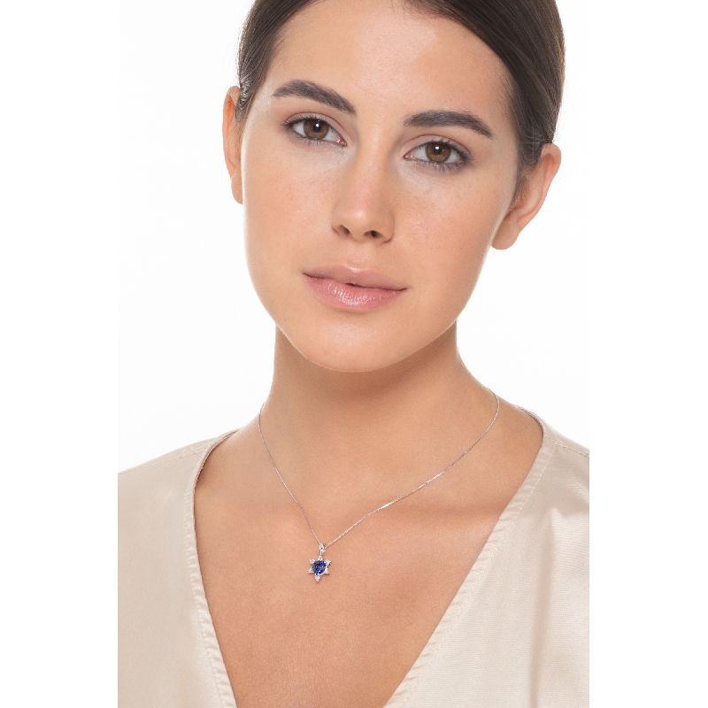 Heart shaped blue sapphires and diamonds pendant