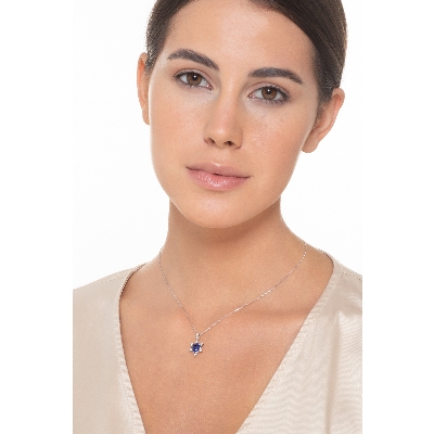 Heart shaped blue sapphires and diamonds pendant