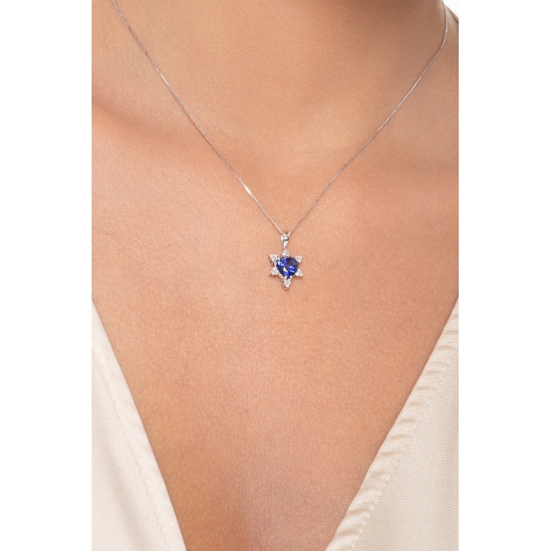 Heart shaped blue sapphires and diamonds pendant