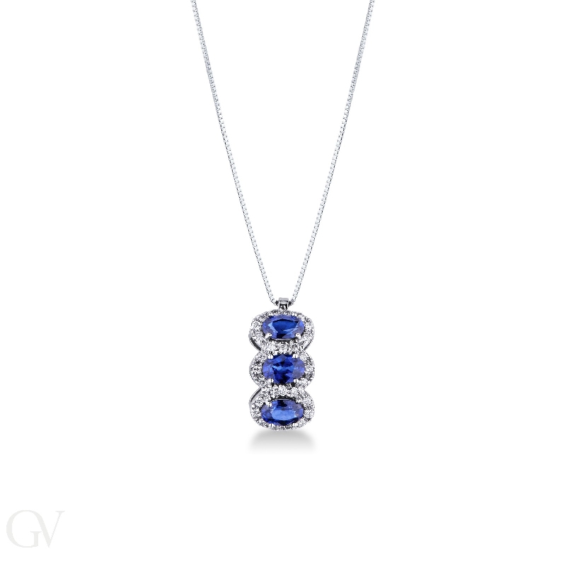 Trilogy pendant with diamonds and 3 oval blue sapphires