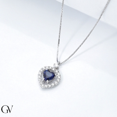 Halo necklace with blue sapphire and diamonds