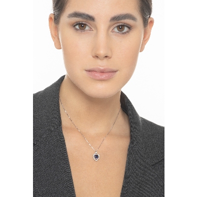 Halo necklace with blue sapphire and diamonds