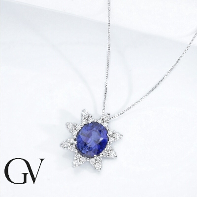 Blue sapphire and diamonds pendant in 18k white gold