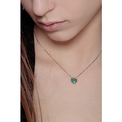 Burnished heart pendant with emeralds