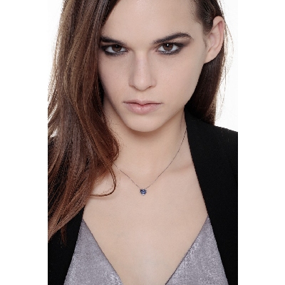 Burnished heart pendant with blue sapphires