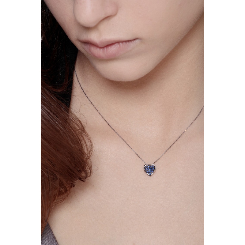Burnished heart pendant with blue sapphires