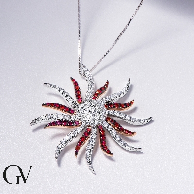 18k white gold necklace with sun pendant with rubies and round cut diamonds