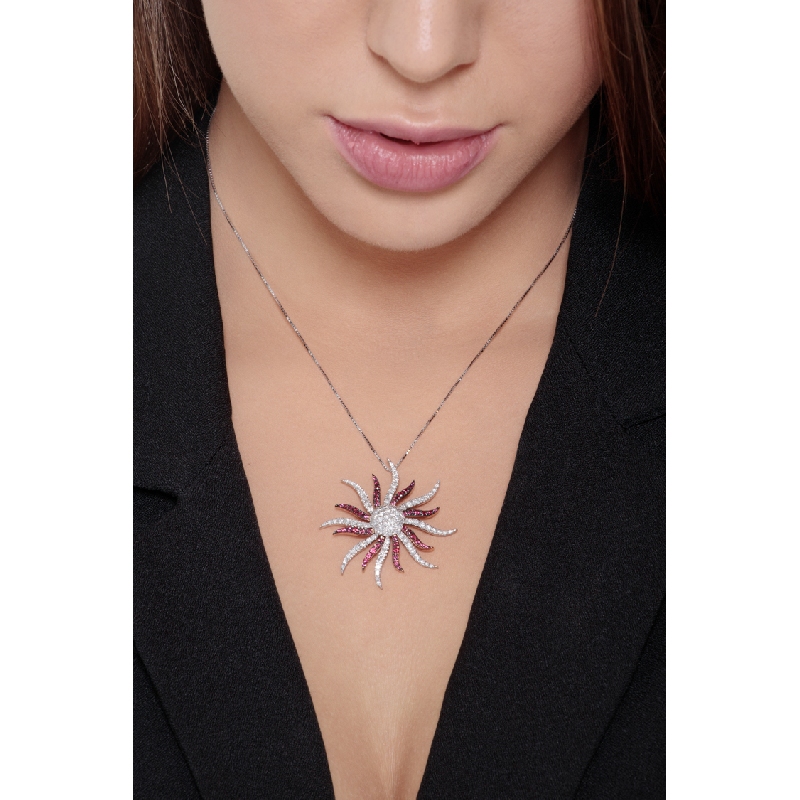 18k white gold necklace with sun pendant with rubies and round cut diamonds