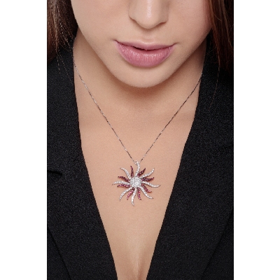 18k white gold necklace with sun pendant with rubies and round cut diamonds