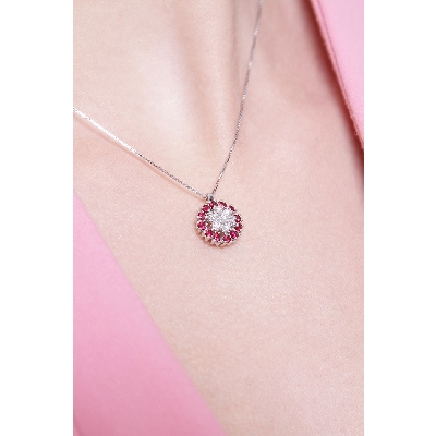 Fancy circle pendant with rubies and diamonds