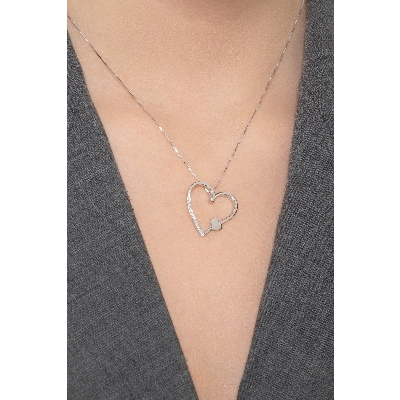 Shiny heart pendant with diamonds