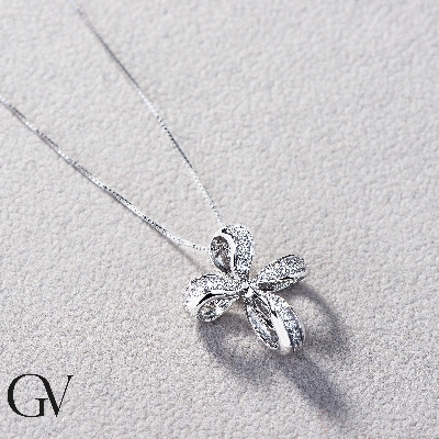 Fancy cross pendant with diamonds