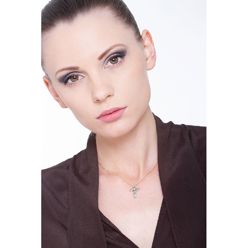 18 yellow gold cross pendant with aquamarine and solitaire diamond