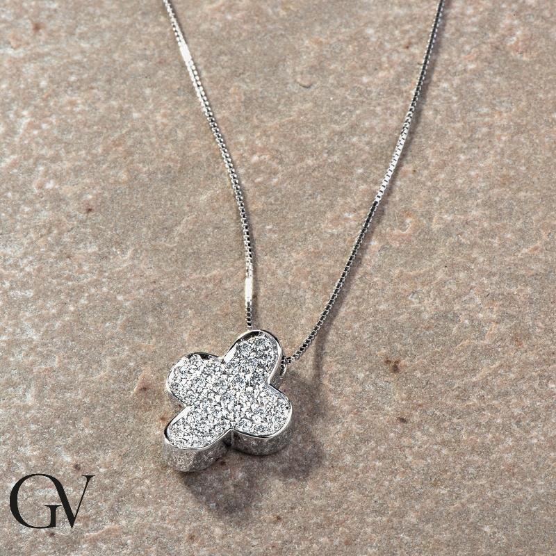 Fancy cross pendant with diamond pavè