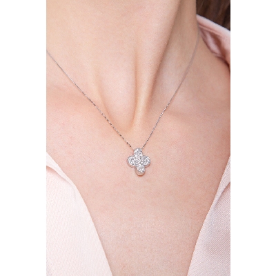 Fancy cross pendant with diamond pavè