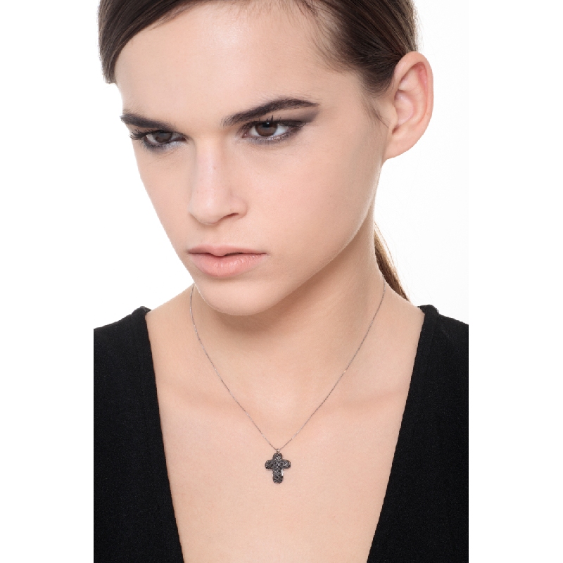 Rounded cross pendant with black diamonds