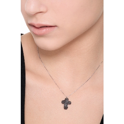 Rounded cross pendant with black diamonds