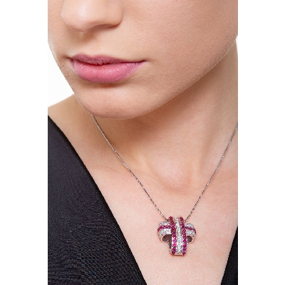 Fancy cross pendant with rubies and diamonds