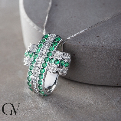 Rounded cross pendant with emeralds and diamonds