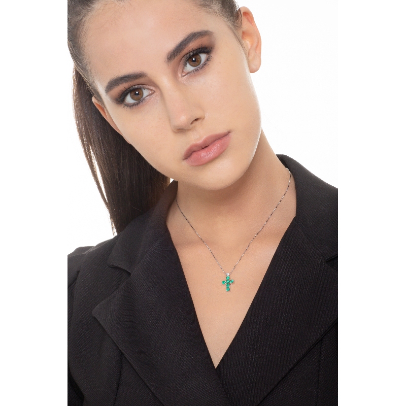 Cross pendant with emeralds