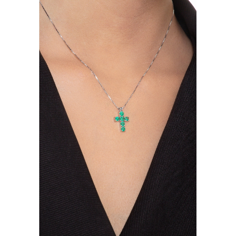 Cross pendant with emeralds