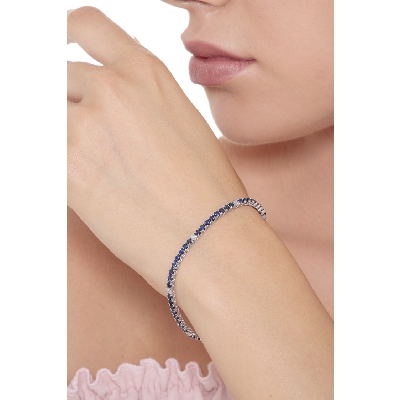 Wire style tennis bracelet with sapphires and diamonds