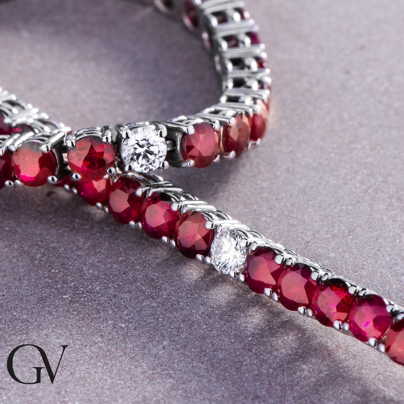 Wire style tennis bracelet with rubies and round cut diamonds