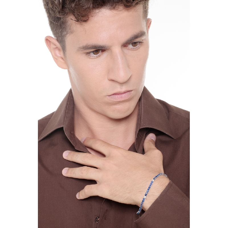 Wire style tennis bracelet with sapphires and round cut diamonds