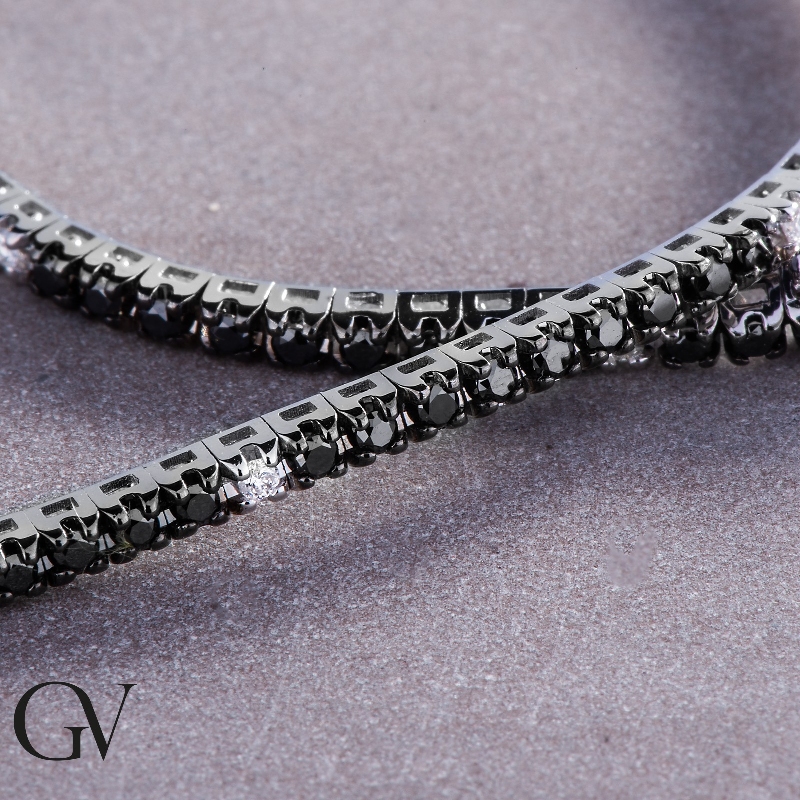 18k white gold tennis bracelet with black and white round cut diamonds