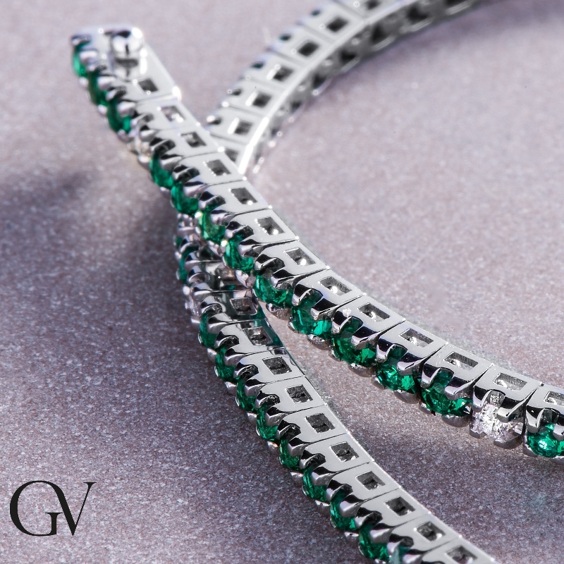 Slim tennis bracelet with emeralds and diamonds