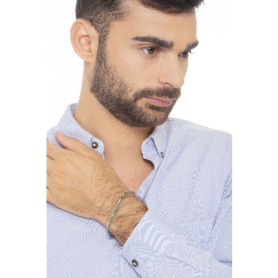 Slim tennis bracelet with emeralds and diamonds