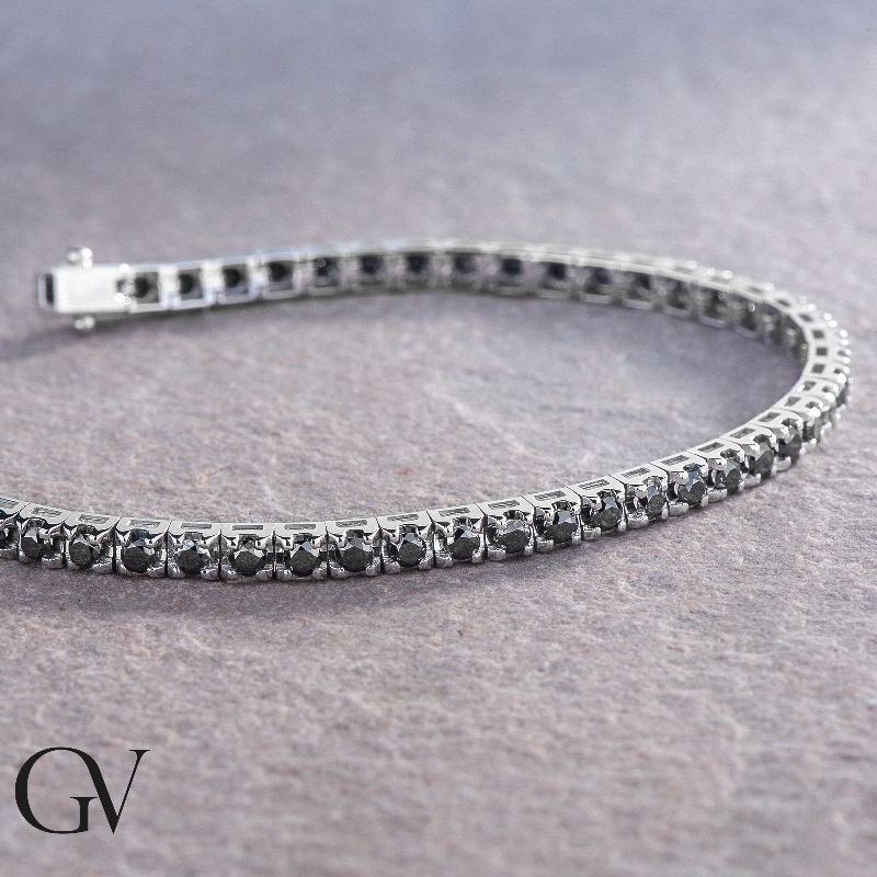 Tennis bracelet in 18k white gold with black diamonds