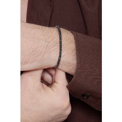 Burnished top tennis bracelet with black diamonds
